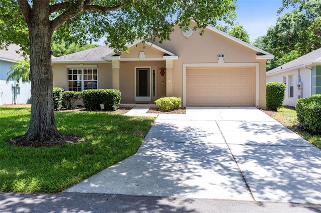 3661 Kingswood Ct, Clermont, FL 34711 - single story home with an attached garage, driveway, a front lawn, and stucco siding