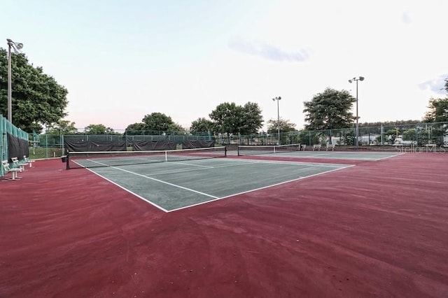 3661 Kingswood Ct, Clermont, FL 34711 - view of tennis court featuring fence and community basketball court