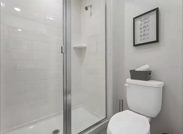 1929 Tropical Palms Cir, Kissimmee, FL 34747 - full bathroom featuring a shower stall and toilet