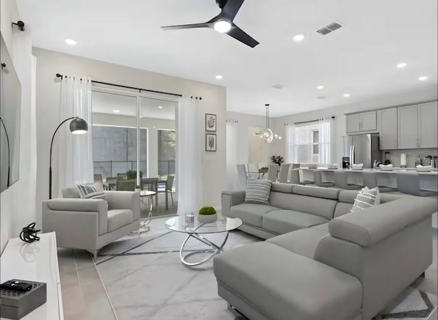1929 Tropical Palms Cir, Kissimmee, FL 34747 - living room with visible vents, recessed lighting, and ceiling fan