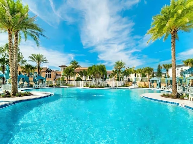 1929 Tropical Palms Cir, Kissimmee, FL 34747 - community pool with fence