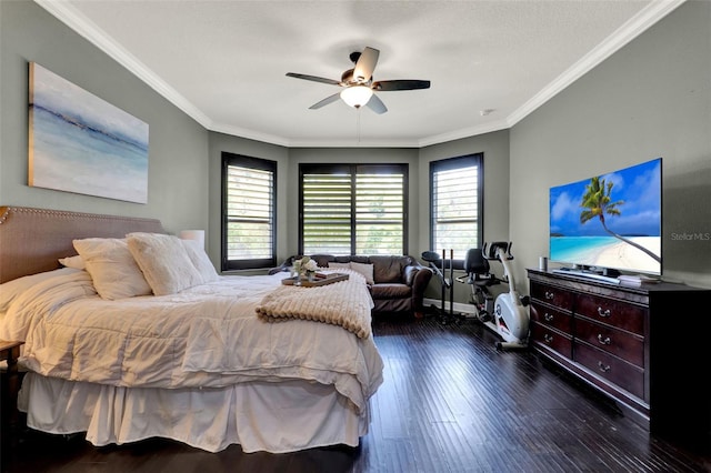 bedroom with a ceiling fan, baseboards, ornamental molding, and wood finished floors