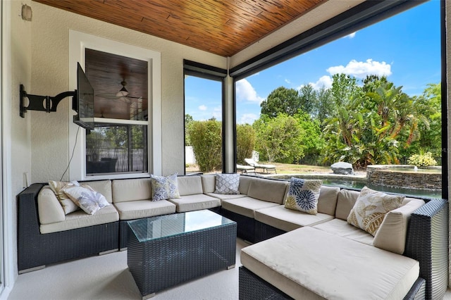sunroom with a textured wall