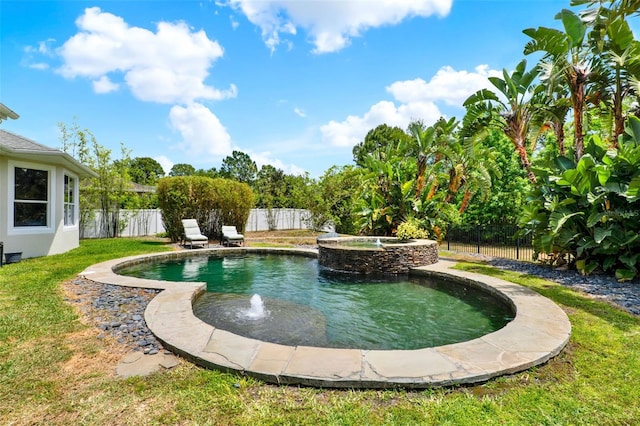 view of swimming pool featuring a yard, an in ground hot tub, and a fenced backyard