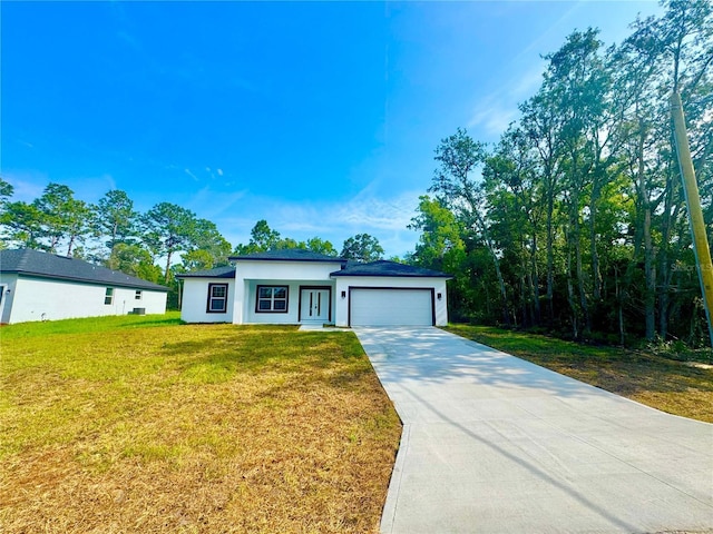 8120 N Maltese Dr, Citrus Springs, FL 34433 - view of front facade with an attached garage, concrete driveway, a front lawn, and stucco siding