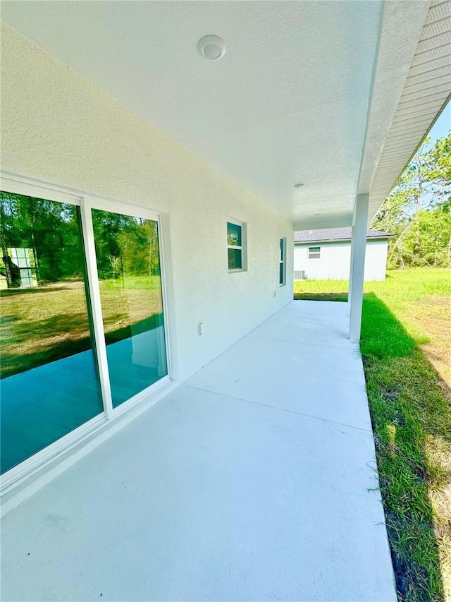 8120 N Maltese Dr, Citrus Springs, FL 34433 - view of patio / terrace