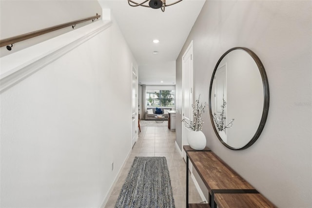 734 Longboat Dr, Davenport, FL 33896 - corridor with light tile patterned floors and recessed lighting