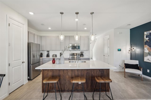 734 Longboat Dr, Davenport, FL 33896 - kitchen with appliances with stainless steel finishes, light tile patterned floors, light countertops, and recessed lighting
