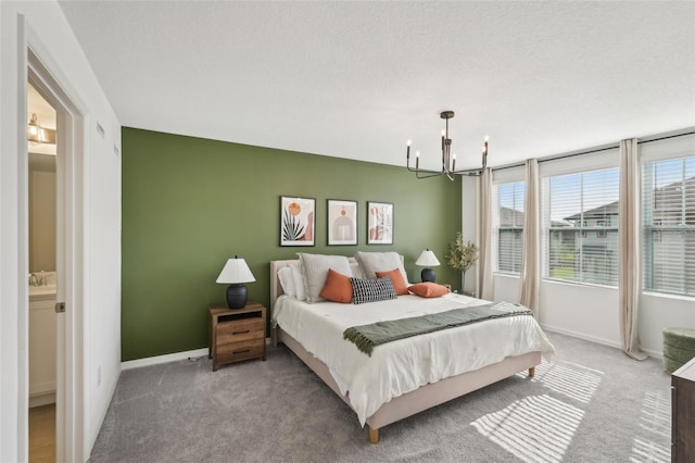 734 Longboat Dr, Davenport, FL 33896 - bedroom with a chandelier, carpet, and baseboards