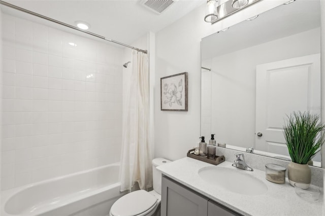734 Longboat Dr, Davenport, FL 33896 - bathroom with shower / bath combo, toilet, and vanity