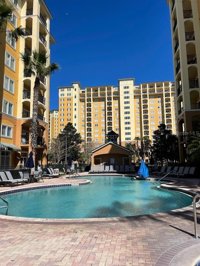 community pool featuring a patio