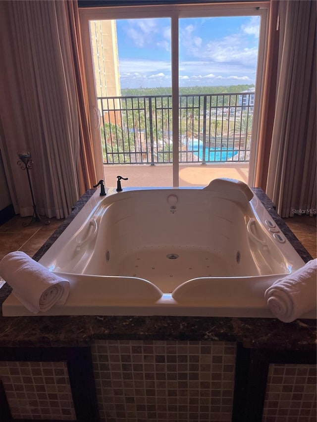 bathroom featuring a jetted tub