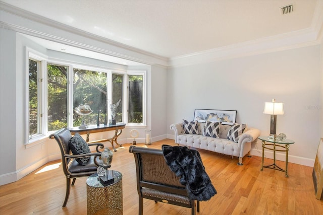 2828 Marquesas Ct, Windermere, FL 34786 - living room with healthy amount of natural light, baseboards, ornamental molding, and wood finished floors