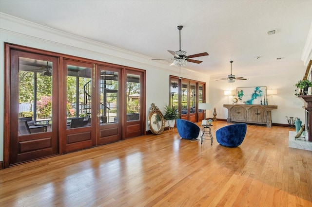 2828 Marquesas Ct, Windermere, FL 34786 - foyer entrance with wood finished floors, ceiling fan, crown molding, french doors, and baseboards