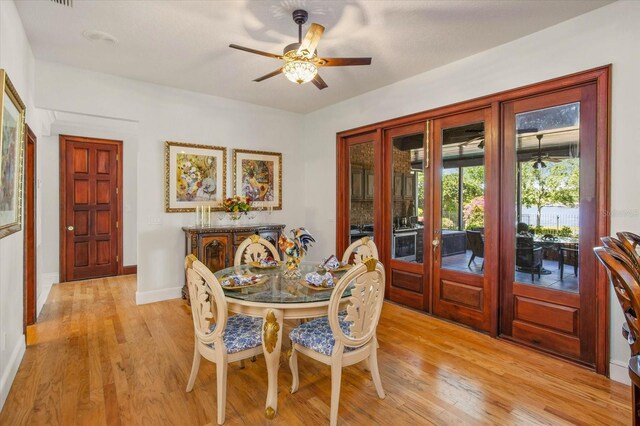 2828 Marquesas Ct, Windermere, FL 34786 - dining room with ceiling fan, light wood-style flooring, and baseboards