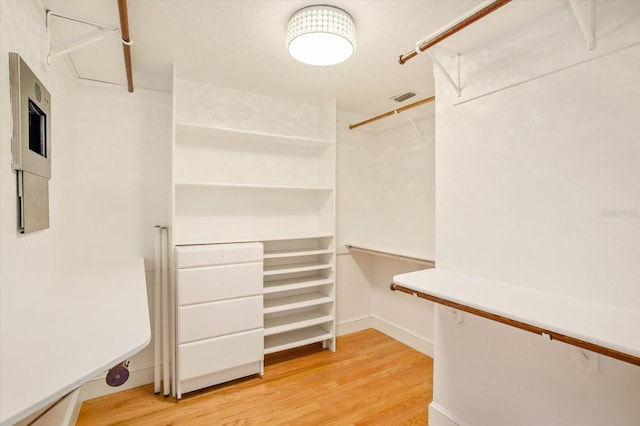 2828 Marquesas Ct, Windermere, FL 34786 - spacious closet with light wood-style flooring