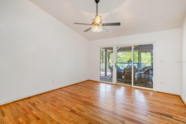 2828 Marquesas Ct, Windermere, FL 34786 - unfurnished room featuring light wood-style flooring, vaulted ceiling, baseboards, and a ceiling fan