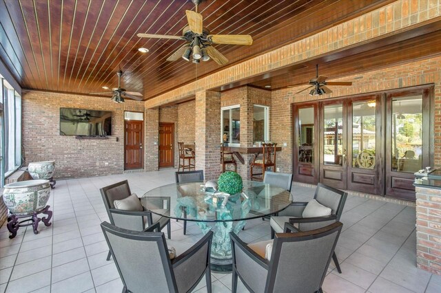 2828 Marquesas Ct, Windermere, FL 34786 - view of patio / terrace featuring ceiling fan, french doors, and outdoor dining area