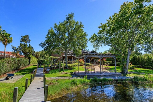 2828 Marquesas Ct, Windermere, FL 34786 - dock with a lawn, a pergola, and a water view