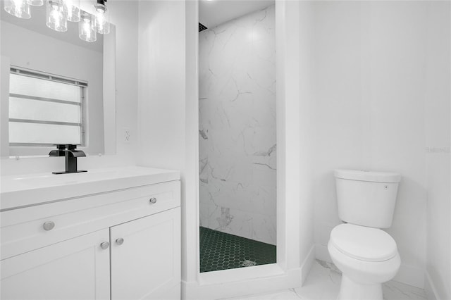 bathroom featuring baseboards, a marble finish shower, toilet, vanity, and marble finish floor