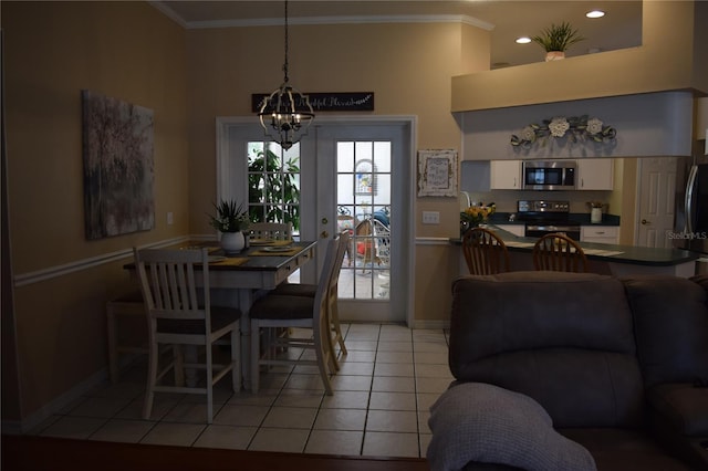 dining space with light tile patterned floors, baseboards, a chandelier, ornamental molding, and recessed lighting