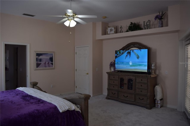 bedroom featuring baseboards, carpet, a ceiling fan, and visible vents