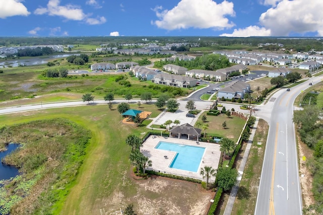 320 Primrose Dr, Davenport, FL 33837 - aerial view of residential area with a nearby body of water and a pool