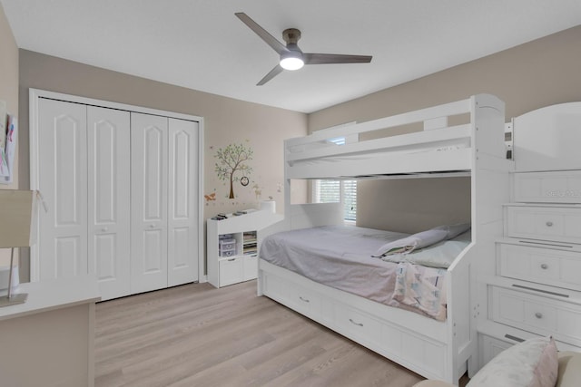 320 Primrose Dr, Davenport, FL 33837 - bedroom with light wood-style floors, a closet, and a ceiling fan