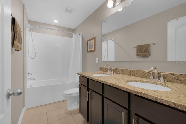320 Primrose Dr, Davenport, FL 33837 - full bathroom featuring tile patterned floors, toilet, shower / bathtub combination with curtain, and double vanity