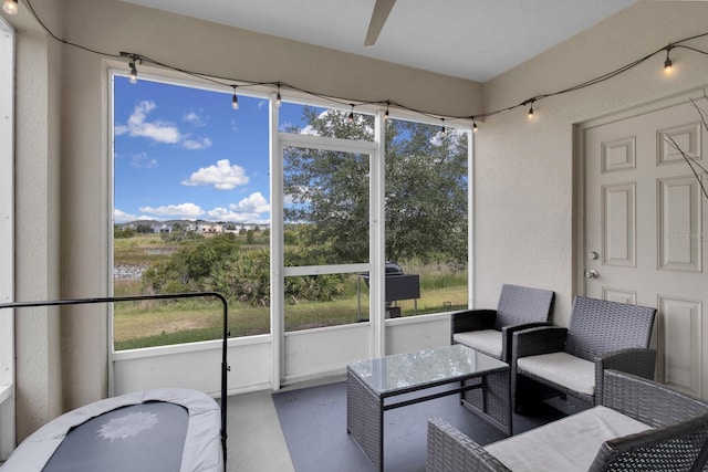 320 Primrose Dr, Davenport, FL 33837 - sunroom featuring healthy amount of natural light and a ceiling fan