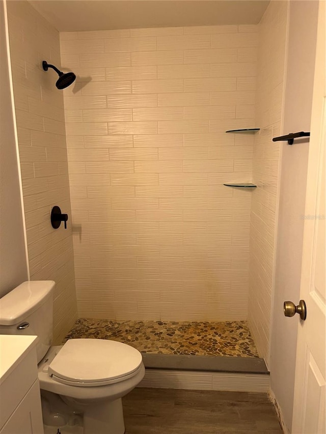 261 Deleon Rd, Debary, FL 32713 - bathroom featuring toilet, a stall shower, and wood finished floors