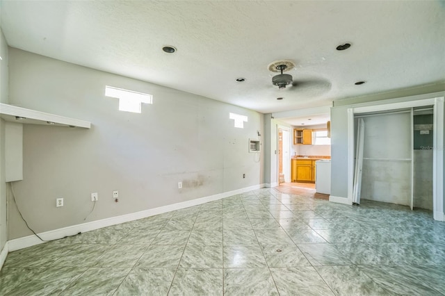 interior space featuring baseboards, a closet, and marble finish floor