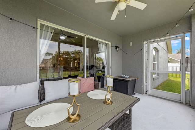 2407 Oakington St, Winter Garden, FL 34787 - sunroom with ceiling fan and outdoor dining space