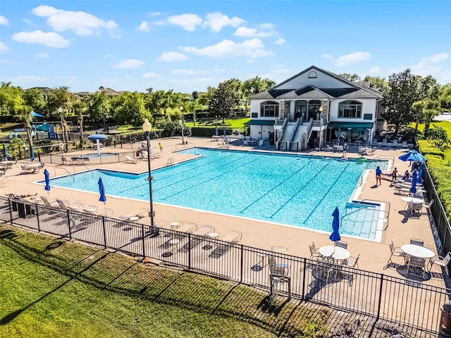 2407 Oakington St, Winter Garden, FL 34787 - community pool featuring a patio area