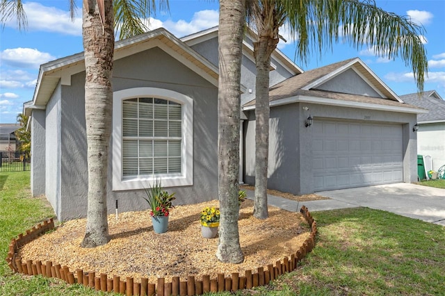 2407 Oakington St, Winter Garden, FL 34787 - traditional-style house featuring stucco siding, an attached garage, concrete driveway, and a front lawn