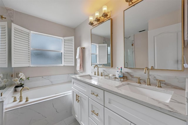 2407 Oakington St, Winter Garden, FL 34787 - full bath with a bath, double vanity, and a shower
