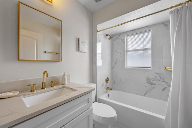 2407 Oakington St, Winter Garden, FL 34787 - bathroom featuring shower / tub combo with curtain, toilet, and vanity