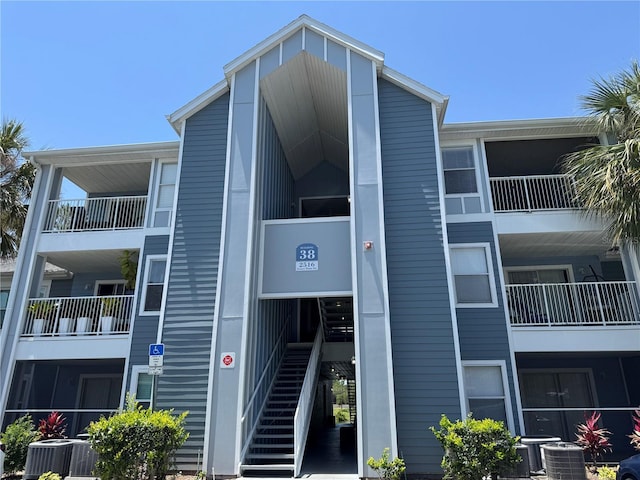 2516 Grassy Point Dr Unit 210, Lake Mary, FL 32746 - view of property with cooling unit and stairs