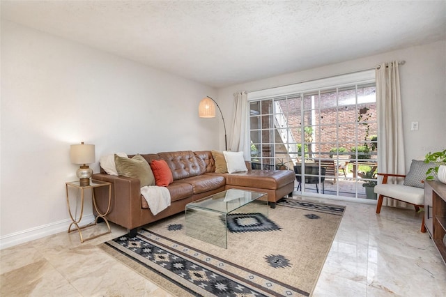 4332 Lake Underhill Rd Unit 12D10, Orlando, FL 32803 - living room featuring baseboards