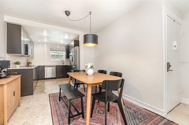 4332 Lake Underhill Rd Unit 12D10, Orlando, FL 32803 - dining room with baseboards