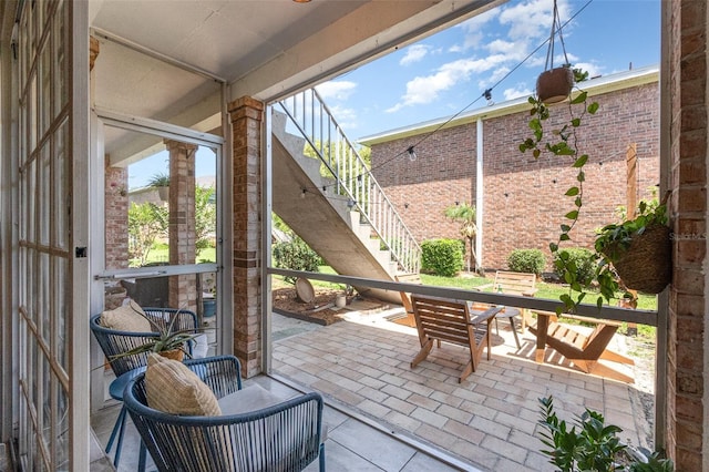 4332 Lake Underhill Rd Unit 12D10, Orlando, FL 32803 - view of patio / terrace with stairs
