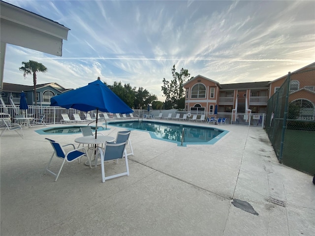 3147 Britannia Blvd Unit A, Kissimmee, FL 34747 - community pool featuring fence and a patio area