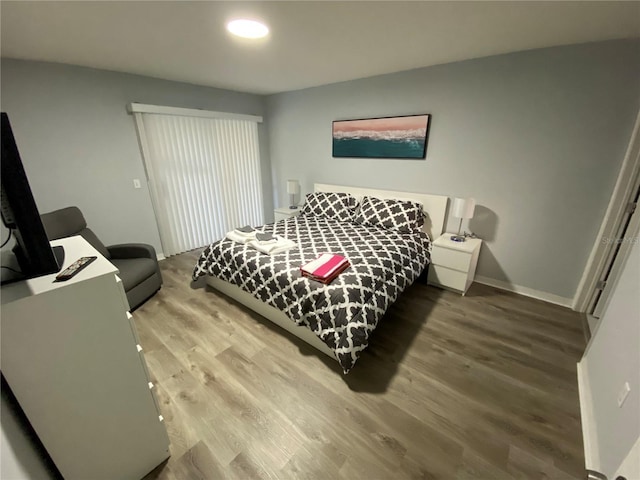 3147 Britannia Blvd Unit A, Kissimmee, FL 34747 - bedroom with baseboards and wood finished floors