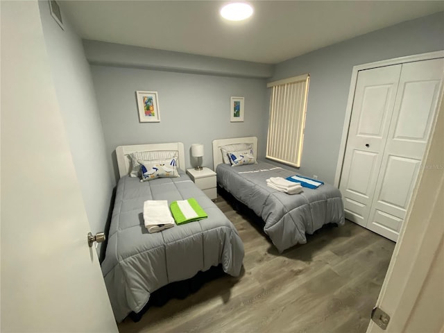 3147 Britannia Blvd Unit A, Kissimmee, FL 34747 - bedroom featuring a closet and wood finished floors