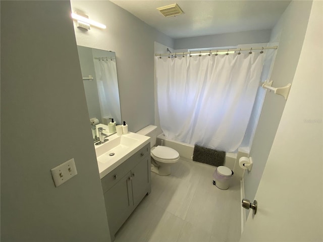 3147 Britannia Blvd Unit A, Kissimmee, FL 34747 - full bathroom with toilet, visible vents, shower / tub combo with curtain, and vanity