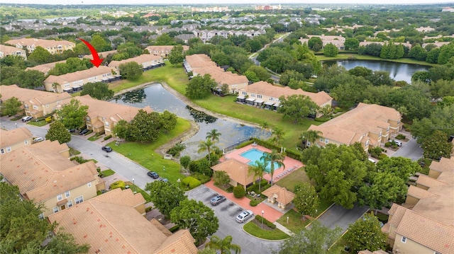 3567 Shallot Dr Unit 103, Orlando, FL 32835 - aerial perspective of suburban area with a large body of water