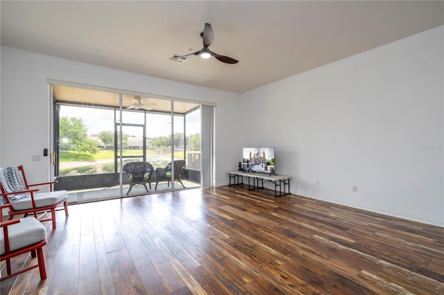 3567 Shallot Dr Unit 103, Orlando, FL 32835 - sitting room with a ceiling fan, hardwood / wood-style flooring, and a sunroom