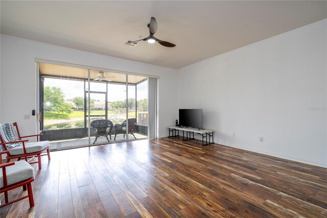 3567 Shallot Dr Unit 103, Orlando, FL 32835 - sitting room featuring a ceiling fan, hardwood / wood-style flooring, and a sunroom