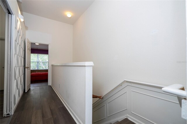 3567 Shallot Dr Unit 103, Orlando, FL 32835 - corridor featuring an upstairs landing and dark wood-type flooring