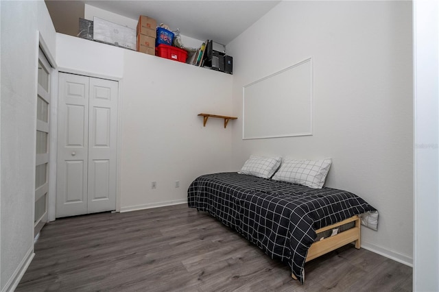 3567 Shallot Dr Unit 103, Orlando, FL 32835 - bedroom with wood finished floors, baseboards, and a closet